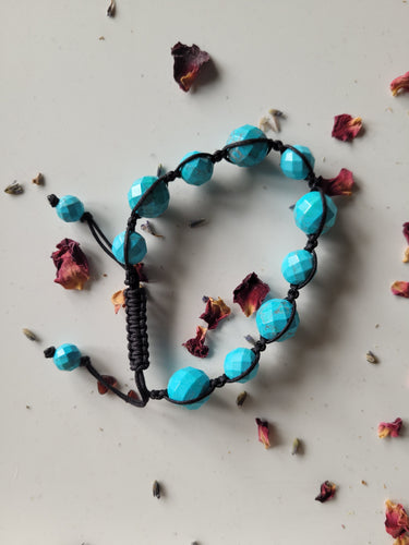 Turquoise Howlite Faceted Beaded Bracelet with Tightening Cord.